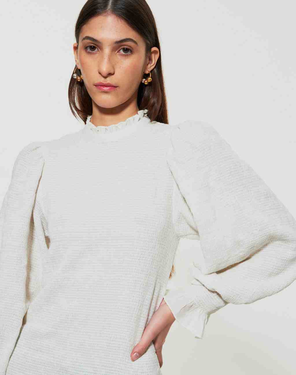 Smocked Hitala Off White Blouse with Ruffled Collar, Cuffs, and Hem | Ideal for Layering