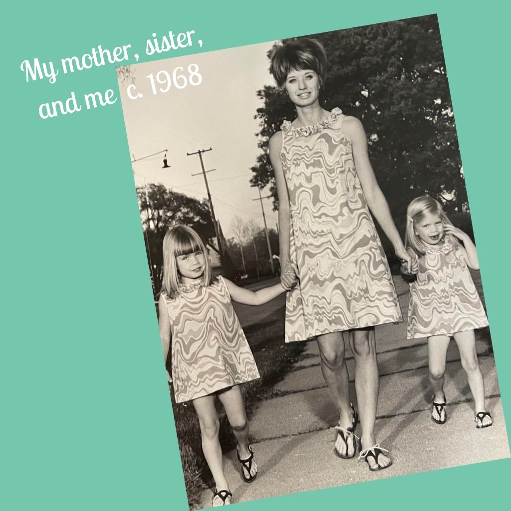 Photo of mother and 2 daughters in the 1960's wearing matching paper dresses-modeling for a newspaper-the founder of Nifty is one of the little girls introducing styles with a 1970s influence-Nifty