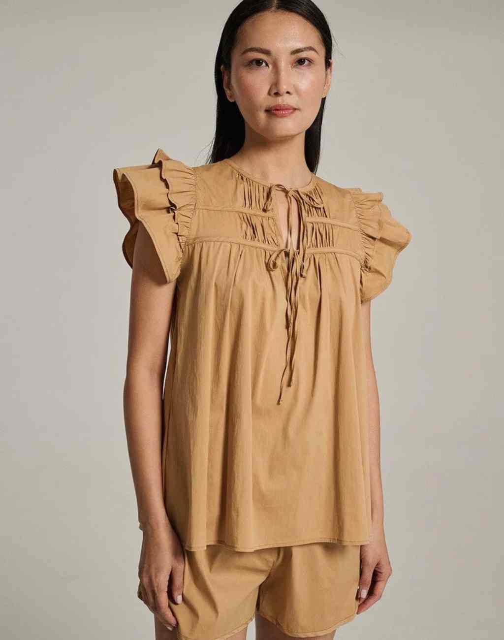 Kunzitis Blouse with Tiered Flutter Sleeves, Pintuck Details and Ties | Beige or White