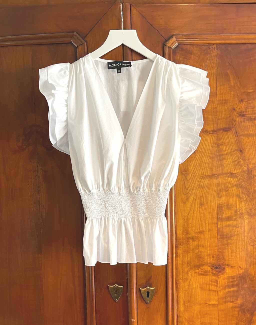 White Cathy Top with Tiered Ruffle Sleeves and Smocked Waist - Visit Nifty Monica Nera 